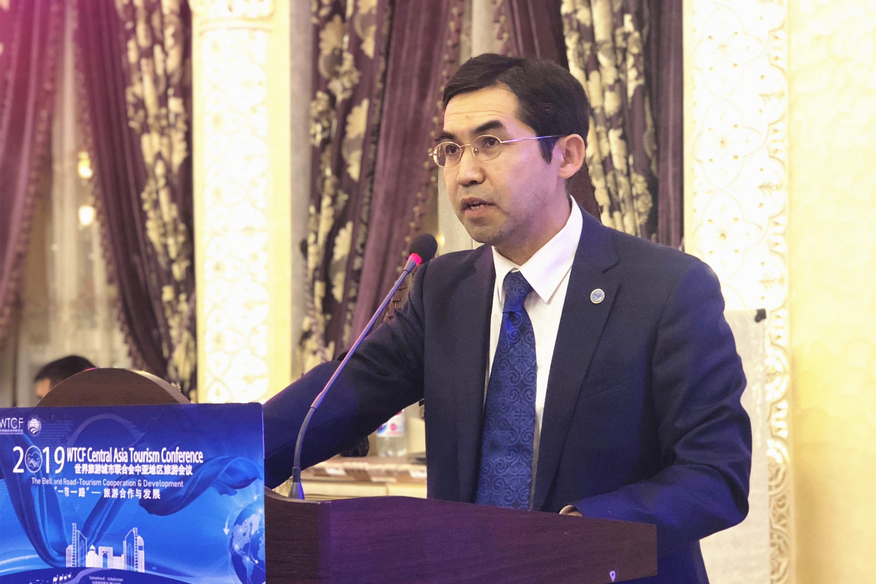 Nurlan AKKOSHKAROV, Deputy Secretary-General of Shanghai Cooperation Organization gives a speech