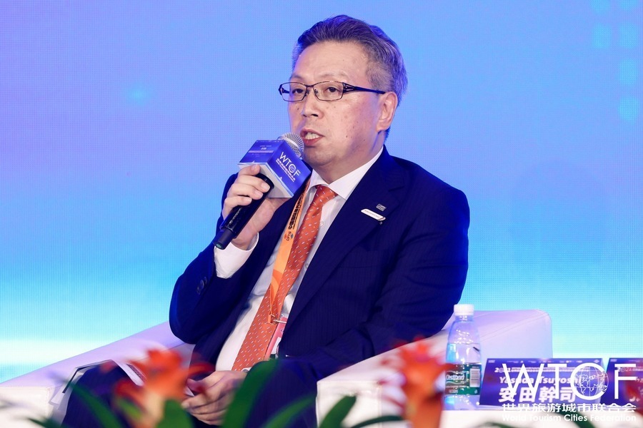 Yasuda Tsuyoshi, Chief Rept. of JTB Corp. Beijing Office speaks at the session.